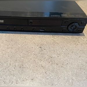 Pioneer DVD player with an assortment of DVD’s